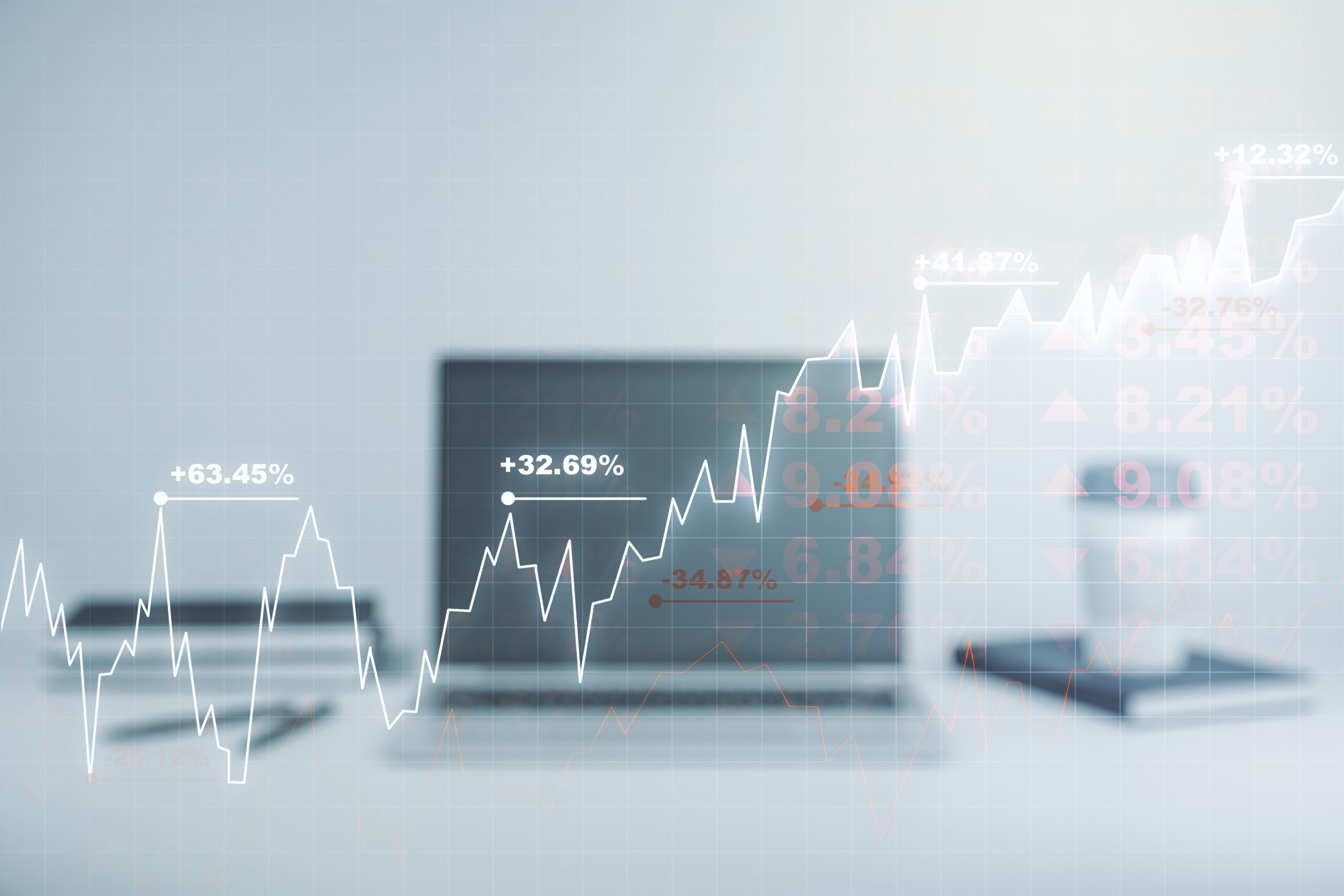 Multi exposure of abstract financial graph on laptop background, financial and trading concept