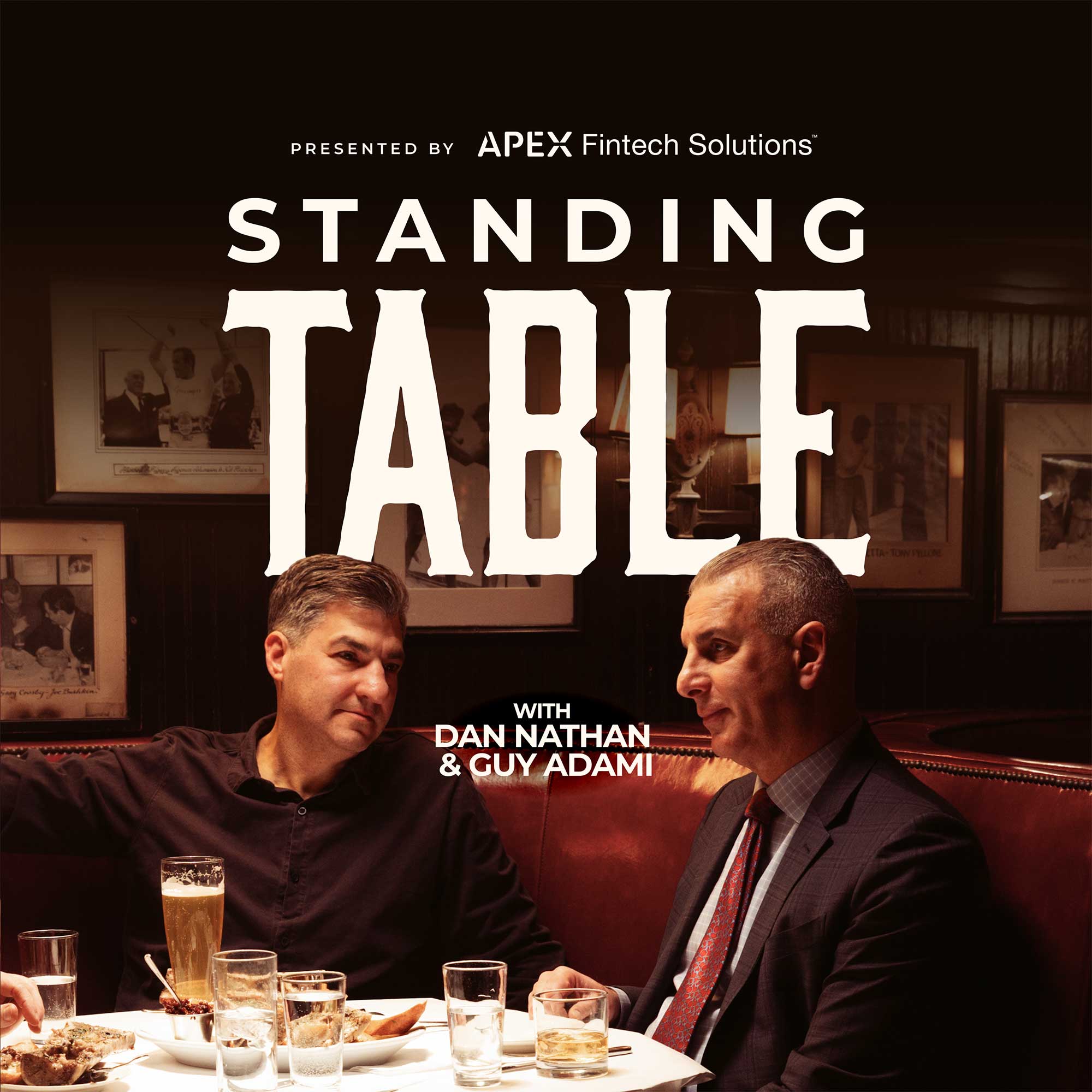 Dan Nathan and Guy Adami sitting at a table in a restaurant with the Standing Table logo overlaid